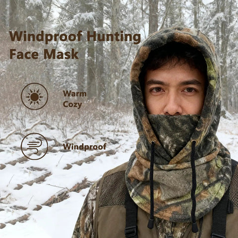 Man wearing Cold Weather Huntin Balaclava Face Mask With Camo Pattern, snow-covered forest background, Windproof and Breathable.