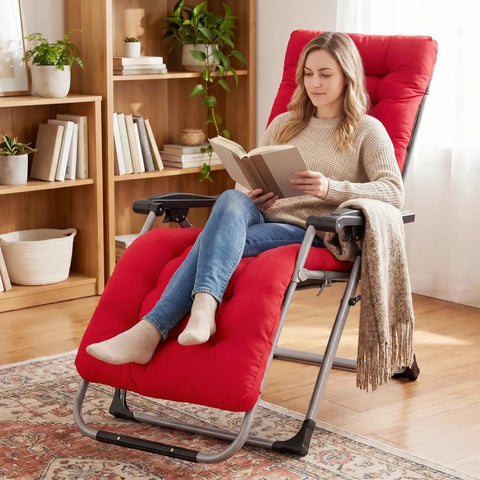 Woman relaxing on a red recliner chair with book, in a cozy room setting with bookshelf and plant.
