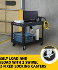 Two Shelf Foam Utility Cart With Lipped Shelves And Ergonomic Handle Black 500 Lb Capacity in warehouse with monitor and tools
