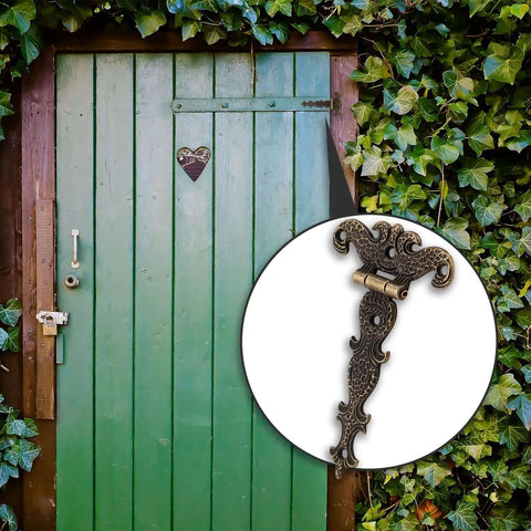 Beefy Heavy Duty Antique Bronze Tee Strap Hinge Set for Barn Doors and Gates shown on rustic green barn door.