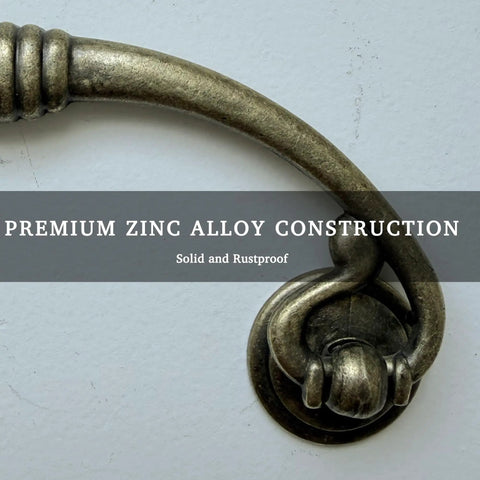 Vintage Bail Drawer Pulls 4 Pack Antique Brass Drop Handles for Dresser Cupboard Wardrobe Kitchen Cabinets close-up view.