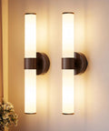 8000mAh Walnut Battery Operated Wall Sconces Set of 2 with white glass shades on a wall, ideal lighting for bedroom or entryway.