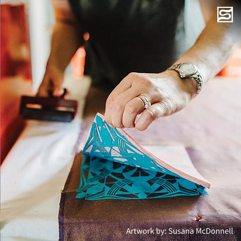 Person using Linocut Cutter Kit 6 Pack With 5 Interchangeable Blades For Smooth Clean Cuts In Linoleum And Soft Blocks No Nonsense Pro Grade