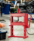 Heavy Duty Six To Twenty Ton H Frame Hydraulic Shop Press With Adjustable Worktable And Plate Set in garage
