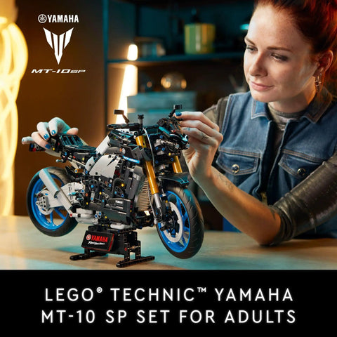 Person assembling Yamaha MT-10 SP Motorcycle Model Kit For Adults 18 Plus Build And Display Realistic Hyper Naked Bike Replica