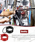 Mechanic using 20 Piece Bike Bottom Bracket Spacer Set With 1mm To 3mm Shims For 7 To 11 Speed Freehub Cassette Anodized Aluminum Hub Washers And BB Adjustment for bike maintenance.