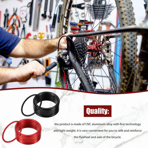 Mechanic using 20 Piece Bike Bottom Bracket Spacer Set With 1mm To 3mm Shims For 7 To 11 Speed Freehub Cassette Anodized Aluminum Hub Washers And BB Adjustment for bike maintenance.
