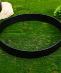 Two Pack Round Concrete Walk Maker Molds Ultra Durable Plastic Stepping Stone Molds on grass surface