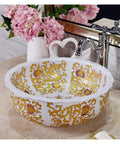 Slick White Ceramic Vessel Sink For Above Counter Bathroom Vanity With Top Shelf Glossy Glaze And Dead Simple Cleanup Round Art Bowl Shape Durable Porcelain with gold pattern.