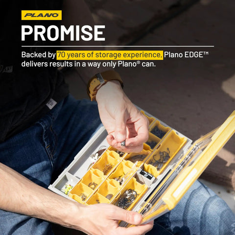 Person holding Edge 3600 Terminal Tackle Storage Box with Rust Resistant Dri Loc Waterproof Seal showcasing compartments.