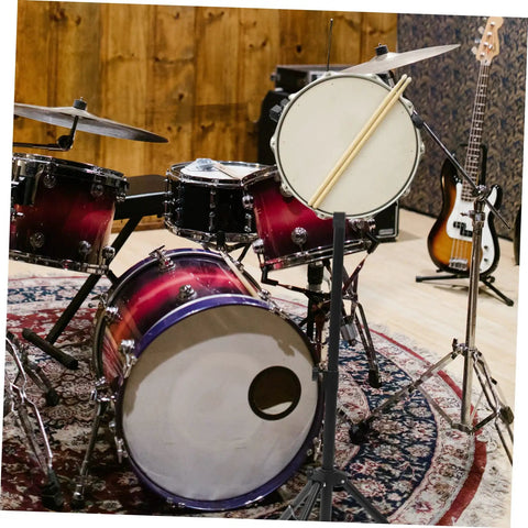 Badass Telescopic Drum Rack Storage Setup For Practice Pads Snare Brackets Collapsible Percussion Shelf Stand Black Heavy Duty Music Gear Kit Ready For Stage Or Garage Use, featuring drums and a practice snare.
