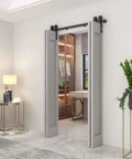 Heavy Duty Bi-Fold Barn Door Hardware Kit for Four Doors with Side Mounted Rollers, installed in a modern living room.