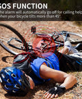 Cyclist lying on ground next to bike with 113dB Vibration Sensing Bike Alarm With Remote And Wireless Receiver For Bicycles Motorcycles E Bikes Scooters Trikes And Mobility Vehicles Anti Theft Security System Keeps Your Ride Safe indicating SOS function.