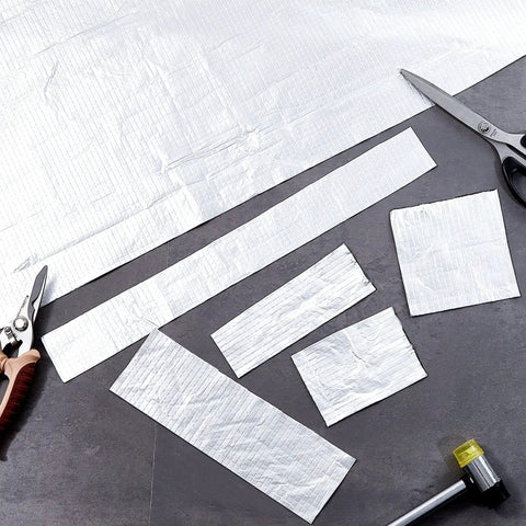Cut pieces of Self Stick Roofing Membrane Roll 35.5 Inch Wide 32.8 Feet Long With Reflective Aluminum Butyl Rubber Waterproof Flashing