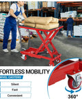 Hydraulic lift table cart, red, 500 lb capacity, scissor lift with non-slip top, front view in warehouse.