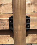 Top Shelf Heavy Duty Privacy Fence Brackets For Standard 2x4 Wood Railings Pre Drilled Galvanized Steel 8 Pack attached to a wood railing.