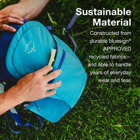 Person holding Daylite Plus Commuter Backpack Lightweight Everyday Carry For Work School And Travel With Padded Laptop Sleeve Water Bottle Pockets
