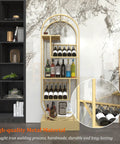 Sleek O Shape Floor Standing Wine Rack With Glass Shelves Boss Level Industrial Storage For Home Bars And Kitchens Kickback Ready Stemware Display Unit Heavy Duty Design That Gets The Job Done, with bottles organized on a golden metal frame.