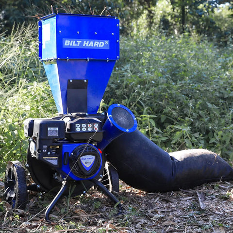 Gas Powered Wood Chipper Shredder Beast 7.5 HP 224cc Dual Function 2 In 1 Heavy Duty Mulcher in forest setting