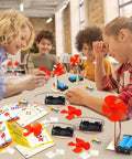 Children assembling Six STEM Fan Kits For Kids Aged 8 To 12 DIY Wooden Fan Building Toys Electric Circuit Experiments in a classroom.