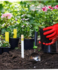 Gardening scene with hand holding potted plant, next to Soil Test Kit with 100 Strips for pH 4.5–9, Easy To Use Test Paper for lawns.