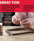 Person using KwikWood Wood Repair Epoxy Putty Stick 1 Oz Beige Tan for rotted wood repairs on a wooden frame, quick set in 15-25 minutes