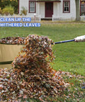 Person raking leaves with a Five-Tine Pitchfork For Gardening 57-Inch Heavy Duty Garden Fork With Fiberglass Handle