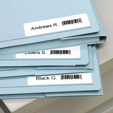 No Sweat Direct Thermal Label Printer With Zero Ink Hassles Engineered For Lightning Fast Shipping Labels on blue file folders.