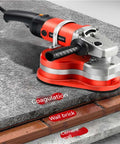 Beast Mode Corded Angle Grinder 2800W Hitting 28000 RPM shown on cement and wall brick surfaces for grinding tasks.