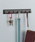 Black Wall Mount Key Rack With 7 Hooks For Hallway And Entry, 14 Inch Key Organizer Rail In Satin Nickel Finish holding keys and purse