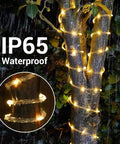 66 Feet Of 200 LED Solar Rope Lights With 8 Modes No Fuss Waterproof Outdoor String Lights In Clear Tube illuminating tree