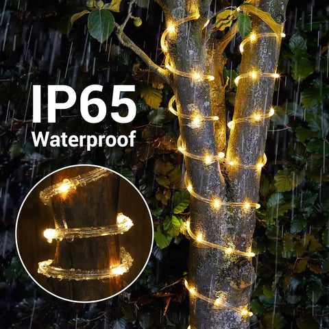 66 Feet Of 200 LED Solar Rope Lights With 8 Modes No Fuss Waterproof Outdoor String Lights In Clear Tube illuminating tree