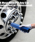Person using Aluminum 33mm Lug Nut Cover Removal Tool Socket For Semi Truck Trailer on chrome wheel, hex shape blue design.