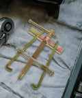 Heavy Duty Carbon Steel Two Jaw Gear Bearing Puller With Reinforced Grips on mechanic workbench for stuck bearing jobs.