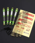 Lengthened Fifty Nine Millimeter Aluminum Oil Filled RC Shock Absorber Upgrade With Three Spring Options Ten Percent Softer Twenty Percent Softer And Twenty Percent Stiffer For Traxxas Defender And Bronco Eighteen Scale Front And Rear Shocks Green with accessories on display