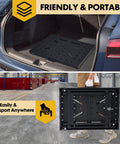 Foldable Welding Table Work Bench With 1000 Lbs Capacity Heavy Duty Steel Construction Pro Grade Portable Weld Table Featuring 0.63 Inch Fixture Holes Spaced 2.6 Inches For Precise Clamps Jigs And Fixturing In Welding Assembly And Repair, folded in a car trunk and carried by hand.