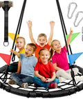 Four happy children sitting on a Spider Web Tree Swing For Kids And Adults, Outdoor Saucer Net Round Swing With Steel Frame And Turnbuckle, 43 Inch Platform, Two Hanging Straps, Great Backyard Park Or Travel Swing, with colorful flags, straps, and metal connectors shown.