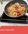 Single Burner Portable Buffet Range With Adjustable Temperature heating pasta on black finish in small kitchen