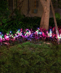 Two Pack Cherry Blossom Solar Garden Lights Outdoor Waterproof Decor Lamps With Heavy Bulb Base Two Modes Patio Yard Garden Accent Lighting For Lit Nighttime Vibes illuminating pathway.