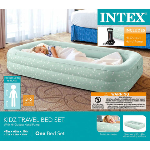 Child sleeping on Kids Travel Air Mattress With Raised Sides And Hand Pump, star print, plush surface, for ages 3 to 6.