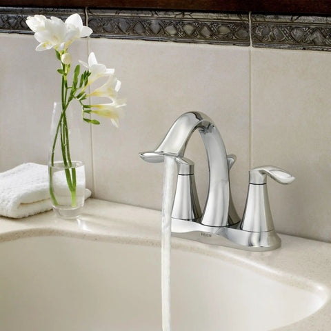 Eva Chrome Two-Handle Centerset Bathroom Sink Faucet With Drain Assembly For 3-Hole Installations in use above sink