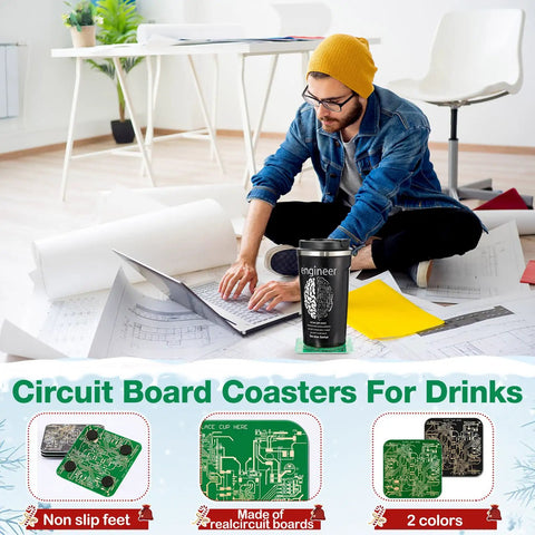 All In One Engineer Gift Set For Men With 17 Oz Stainless Steel Tumbler Circuit Board Cup Mats And Cool Circuit Socks A Practical Thank You Gift For Aerospace Mechanical And Electrical Engineers, featuring a man using a laptop on the floor with a tumbler.