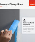 Hand peeling blue painter tape for renovations and DIY projects with sharp edges no bleed masking for easy clean removal.