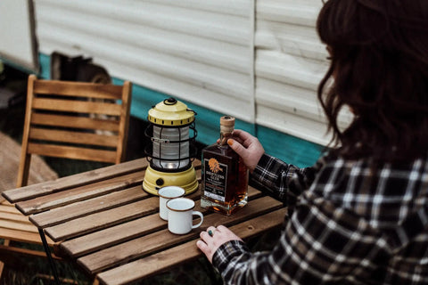 Dusty Yellow Forest Lantern Vintage Rechargeable Led Lantern With Adjustable Brightness Battery Operated Camping Light placed on wooden table.