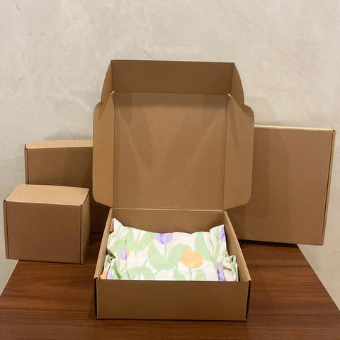 Heavy Duty 20 Pack Of 10X10X3 Inch Brown Corrugated Cardboard Shipping Boxes With Smooth Finish Edges displayed open with packaging.