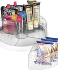 12 Inch Lazy Susan Turntable with Removable Bins holding snacks, tube bin filled with candies and dividers for pantry organization.