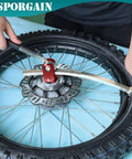 Dirt Bike Tire Changing Stand For 16 To 21 Inch Rims Heavy Duty Portable Tire Tool Works With 10 To 25mm Axle Sizes in use