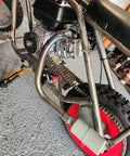 Installed Beefy Heavy Duty Exhaust With Muffler For Predator 212cc 6.5 HP Honda GX160 GX200 on go-kart frame in garage.