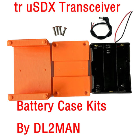 Kick Ass Solid Orange PETG Battery Case Kit For Tr Usdx Transceiver Packs with battery holder and accessories.