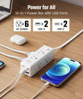 Top Shelf 15 Ft Extension Cord With Super Slim Flat Plug And Ten Spacious Outlets Including Six AC Jacks Two Quick Charge USB C Ports And Two Standard USB A Pads For No Nonsense Multi Gadget Charging At Home Or On The Road, shown on wooden desk.